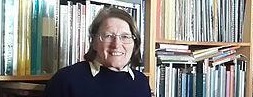 Kathy Munro with her books. Photo by Lucille Davie